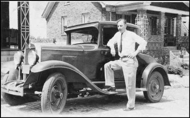 Bernard Lynn Poché with his Chevrolet in Pittsburgh, Pennsylvania.